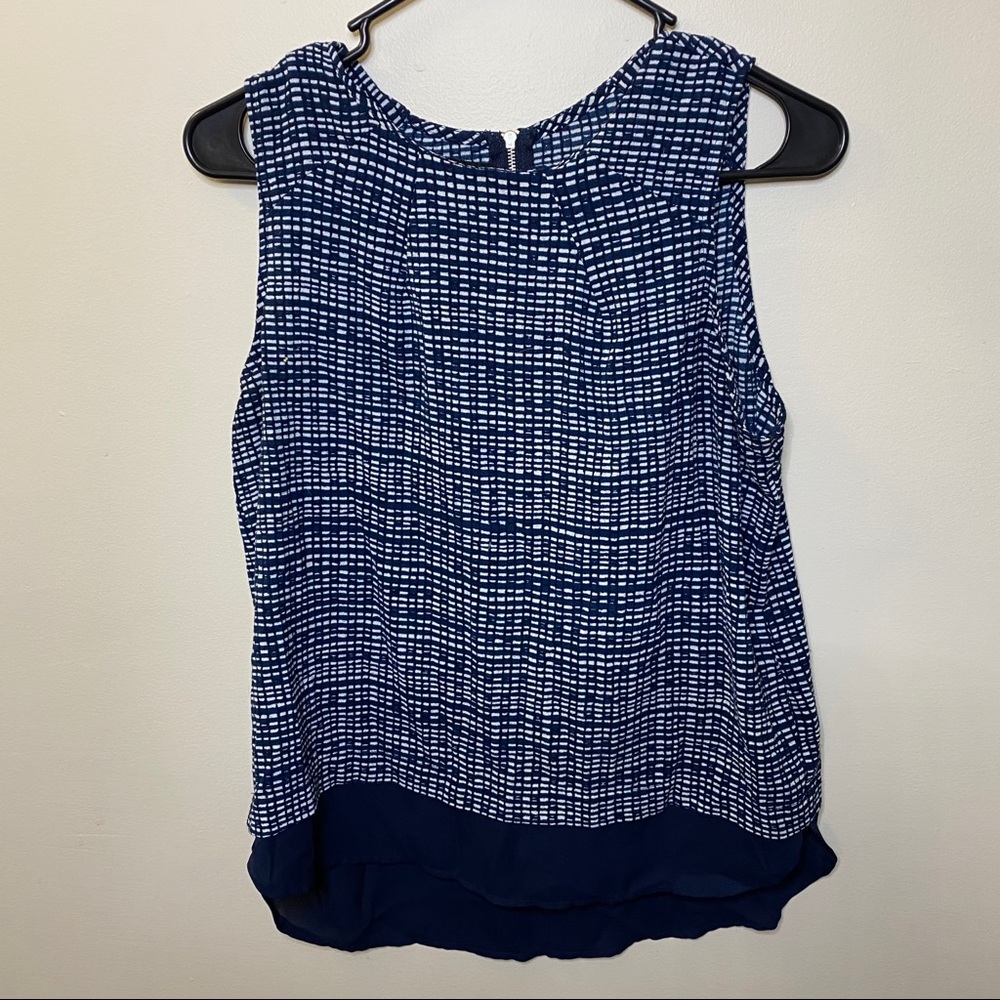 Simply styled blue sleeveless blouse